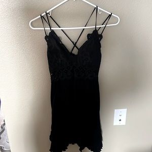 Size medium, black dress. Wishlist apparel, stretchy material.